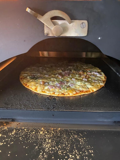Pizza oven voor in Zuid-Afrikaanse Braai
